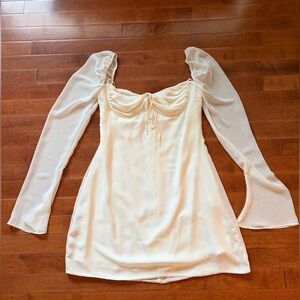 Elegant Cream min Dress with Sheer Sleeves
